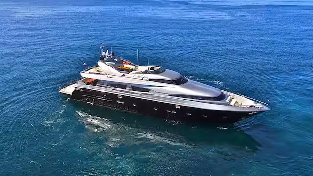 Luxury yacht cruising in the open ocean with sleek design and modern amenities